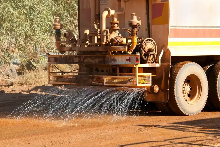 Water suppression of dust on construction site for environmental controls